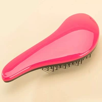 New pet comb dog bàn chải tóc nhựa massage kim comb mèo Teddy pháp luật để đi chải tóc vẻ đẹp sạch nguồn cung cấp 	găng tay chải lông chó mèo	