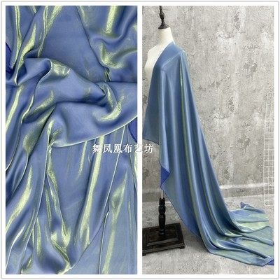 taobao agent Peacock blue gold-woven glass silk cotton linen bright luster silky silk fabric shirt trousers dress fabric