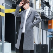 Áo gió mùa thu và mùa đông nam dài qua đầu gối Thanh niên phiên bản Hàn Quốc của chiếc áo khoác len mỏng học sinh đẹp trai lỏng lẻo