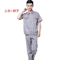 Серо-оранжевый костюм с полурукавами