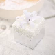 Серебристо-белый подарочный пакет около 8*11 см.