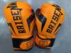 Orange children's boxing gloves