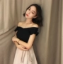 2018 mới hoang dã Hồng Kông hương vị retro chic thời trang Hàn Quốc nhỏ bay tay áo len bị rò rỉ vai rắn màu áo thun top áo nữ cao cấp