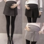 Phụ nữ mang thai mùa thu 2018 mặc quần short váy len mùa thu và mùa đông Hàn Quốc phiên bản dành cho bà bầu dạ dày nâng eo quần short quần kaki bầu