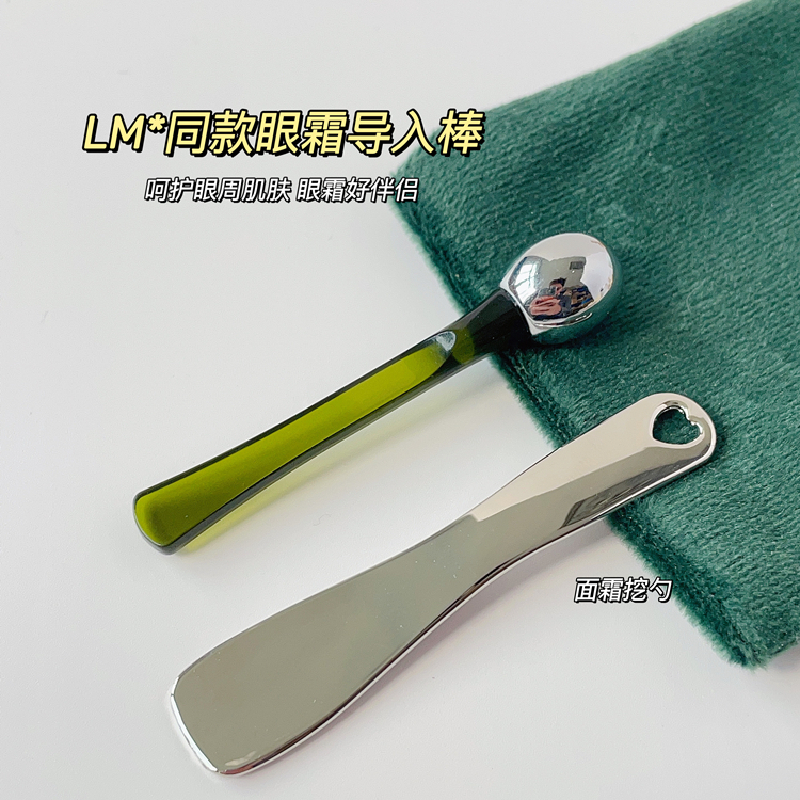 Dark green eye cream stick and cream spoon (comes with flannel bag or storage box)