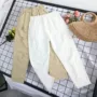 Eo cao lỗ trắng chín điểm quần jean nữ hoang dã thời trang nguyên cạnh giản dị đàn hồi eo hậu cung chân quần 001 quần áo nữ