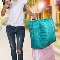Hàn quốc phiên bản của nylon chống thấm nước gấp du lịch lưu trữ túi xe đẩy trường hợp lưu trữ túi người đàn ông và phụ nữ quần áo hoàn thiện túi vali kéo cao cấp