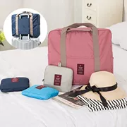 Túi du lịch có thể gập lại dung lượng lớn túi lưu trữ xách tay du lịch lên máy bay túi hành lý nữ ngắn không thấm nước xe đẩy túi
