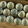 Ngoài ra gốm tím gốm kungfu đặt chén trà đá vẽ tay màu xanh và trắng thư pháp nổi tiếng cầu lông chén núi nhà trà bình pha trà giữ nhiệt lock&lock