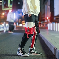 Ins Guo Chao overalls nam thương hiệu lỏng hip hop ruy băng chức năng nối chic chic chân quần nam mùa thu và mùa đông quần áo nam hàng hiệu