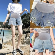 Bà bầu denim quần short hè 2019 mới khoét lỗ quần mới mặc rộng size thời trang mẹ thủy triều phiên bản Hàn Quốc - Phụ nữ mang thai quần / quần bụng