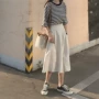 Dora Chaoren Hall Hồng Kông hương vị retro chic hoang dã sọc T-shirt + cao eo màu rắn chân rộng váy quần phù hợp với nữ mùa hè đồ bộ nữ mặc nhà