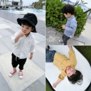 Streaky quần áo trẻ em cậu bé 2018 mới màu rắn thêu áo sơ mi Hàn Quốc phiên bản của thời trang thủy triều rắn màu áo giản dị áo sơ mi nhỏ