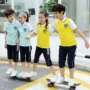 Đồng phục học sinh tiểu học trò chơi thể thao màu xanh vàng ve áo quần ngắn tay bảy quần phù hợp với mùa hè in ấn tùy chỉnh đồ bộ bé trai