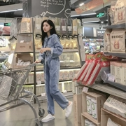 Izs denim jumpsuit của phụ nữ jumpsuit dài tay áo eo ánh sáng màu xanh lỏng bf gió dụng cụ mảnh jeans triều