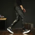 Quần da nam 18 mùa xuân mới Harlan chân quần xe máy đầu máy Slim Hàn Quốc PU quần da bó sát nam