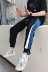 Lv Xiaohu mùa thu thương hiệu thủy triều châu Âu và Mỹ nhấn dải màu Velcro chân quần nam phiên bản Hàn Quốc của quần thể thao giản dị chân quần