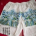 [古 阿 新] Trung Quốc phong cách thêu Trung Quốc bông và vải lanh khóa trắng mùa hè băng thêu gió quốc gia quần short quần áo nam hàng hiệu Quần short
