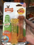 Соединенные Штаты Нилабоне Нишинджи зубы кусают жевательную резинку в собачьих щенков маленькие среды, которые размещены игрушками, стирают зубы и зубы
