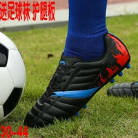 Giày bóng đá bị hỏng Ding người đàn ông và phụ nữ tiểu học và trung học thanh niên non-slip đào tạo cỏ nhân tạo mặc trẻ em giày bóng đá giày thể thao puma