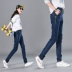 2018 mùa xuân eo cao jeans của phụ nữ quần mùa xuân đàn hồi eo quần cộng với chất béo kích thước lớn lỏng giải trí hậu cung quần chân chân váy bò Quần jean