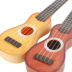 Đàn guitar nhạc trẻ em có thể chơi nhạc cụ mô phỏng giáo dục sớm cho trẻ em nhựa Nghĩa đồ chơi nhỏ bán buôn đồ chơi cho bé Đồ chơi âm nhạc / nhạc cụ Chirldren
