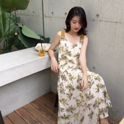 Xiaoyi tùy chỉnh YESWOMEN nước ngoài hoa chất liệu không tay sling gió lạnh ăn mặc không thường xuyên đầu gối váy dài