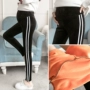 Bà bầu cộng với quần legging nhung mùa đông dày nhung vàng nâng bụng mặc quần nhung đôi ấm áp chân quần quần vải bầu