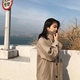 Zhuangzhuang mùa đông Hàn Quốc tính khí áo dài nữ chic len áo cao đẳng gió áo len thủy triều