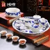 Màu xanh và trắng sứ tinh tế bộ trà hộp quà tặng đặc biệt Kung Fu Jingdezhen tổ ong trà bộ gốm rỗng đĩa trà tròn - Trà sứ Trà sứ