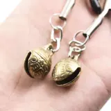 Бронзовый колокольчик, портупея, игрушка