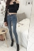 Đầu mùa thu mới Hàn Quốc phiên bản của bất thường eo hollow cao eo jeans thời trang Mỏng mỏng feet quần bút chì phụ nữ đồ công sở nữ Quần jean