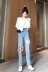 Hồng Kông-hương vị Hàn Quốc phiên bản của lỗ jeans ánh sáng màu xanh chín điểm thẳng quần + mỏng dài tay trùm đầu kem chống nắng áo sơ mi phù hợp với phụ nữ đồ bộ pijama Bộ đồ