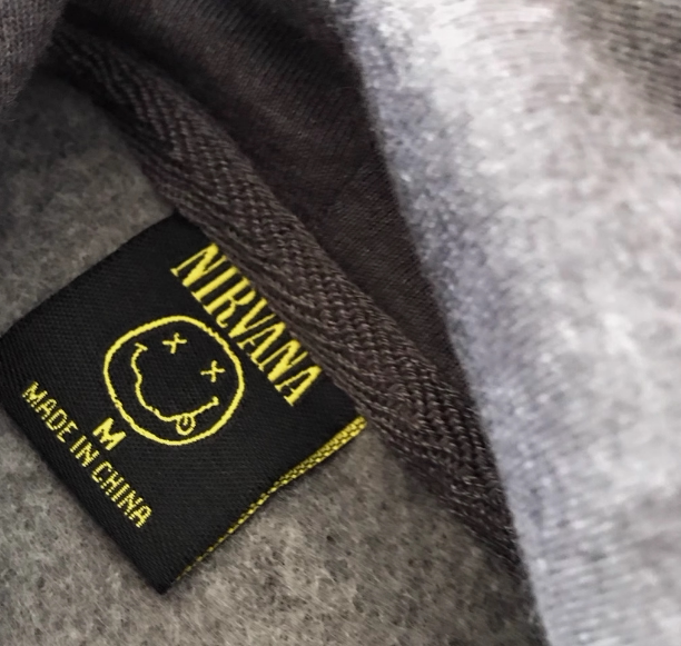 Nirvana Borrow ~ графемы иероглифы, įvairный набор символов на китайском, похоже на декоративный принт, без уточнения