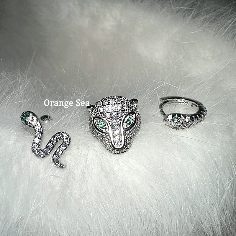 Оранжевые морские супер-ускоряющие острые серьги Девушка дикий Diamond Зеленый глаз Змея Леопард Ниша Винт Ear Bone Nail
