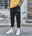 Mùa thu mỏng mặc quần yếm nam cộng với phân bón XL chất béo lỏng Harlan phiên bản Hàn Quốc của xu hướng quần chín quần jean nam đẹp Quần Harem