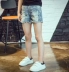 Mùa xuân và hè 2019 cô gái mới quần short denim Trẻ em Hàn Quốc hoang dã được cọ xát thô quần nóng - Quần