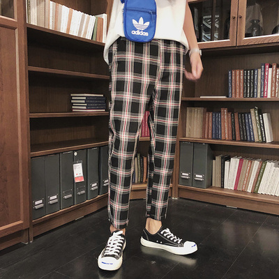 Phong cách Hồng Kông đôi lỏng lẻo kẻ sọc thể thao quần âu nam xu hướng Hàn Quốc sinh viên chân nhỏ hoang dã Quần dài Harlan - Quần mỏng