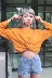 Mùa thu của phụ nữ 2017 new retro Hồng Kông hương vị chic màu rắn đoạn ngắn eo chéo thắt nút dài tay áo len top