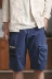 Madden dụng cụ phong cách Nhật Bản Ami, túi lớn năm điểm yếm cổ điển giản dị hoang dã quần short màu xanh quần baggy nam Quần làm việc