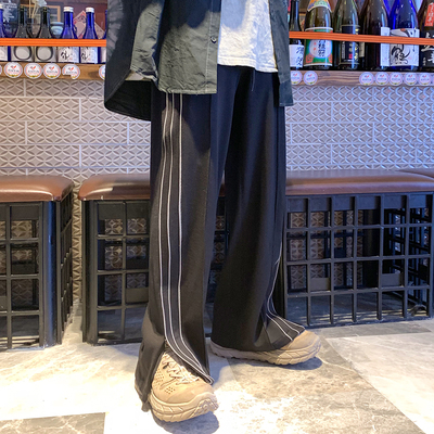 Leman Jin Jun Quần âu Nam Hàn Quốc Sinh viên hợp thời trang Quần ống rộng Hip Hop Quần sọc phản quang - Quần mỏng