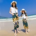 Mẹ và người phụ nữ đi nghỉ mát bên bờ biển đặt chín điểm quần chùm một gia đình ba quần đi biển quần cha-con - Trang phục dành cho cha mẹ và con quần áo trẻ em xuất khẩu Trang phục dành cho cha mẹ và con
