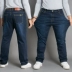 Quần jean nam size lớn cho nam quần béo thẳng cộng với quần nhung lỏng và quần phân bón để tăng độ đàn hồi để giữ ấm