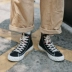 Giày vải trắng Guque nam cao giúp học sinh Phiên bản Hàn Quốc của xu hướng giày nam bình thường Giày thủy triều mùa hè Giày cao gót nam - Plimsolls