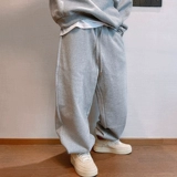 Дэнниндзи весенний прилив бренд ретро Хай -стрит Универсальный чистый цвет силуэт 500G Тяжелые ватные шерстяные брюки Человек