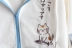 Phong cách tươi trẻ Nhật Bản bé trai và bé gái dễ thương mềm mại bé gái màu sắc phù hợp áo khoác có mũ trùm đầu mèo cưỡi cá thêu học sinh trung học áo len dáng rộng