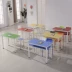 Học sinh tiểu học và trung học cơ sở bàn ghế trường học trẻ em màu sắc nghệ thuật kết hợp bàn đọc sách lớp học bàn đào tạo tùy chỉnh - Nội thất giảng dạy tại trường Nội thất giảng dạy tại trường