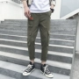 Quần âu nam mùa hè phiên bản Hàn Quốc của gió mới quốc gia Slim chân chín quần xu hướng thanh niên thương hiệu quần yếm shop quần jean nam