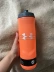 Một Dema UA phích hợp tác thể thao bóp vỏ chai nước bột màu cam đen biển Amoy tại chỗ