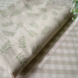 Зеленая листовая печать фон обратной ткани конопли, оранжевый линолен полуотлет.